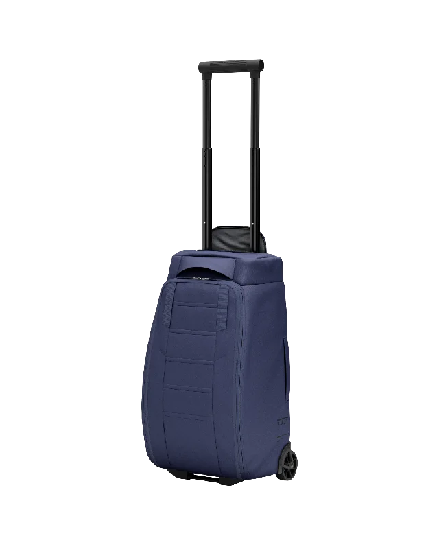 Travel - Size Toiletry Bottles with Leak - Proof Caps in ClearHugger Roller Bag Carry-on 40L Blue Hour