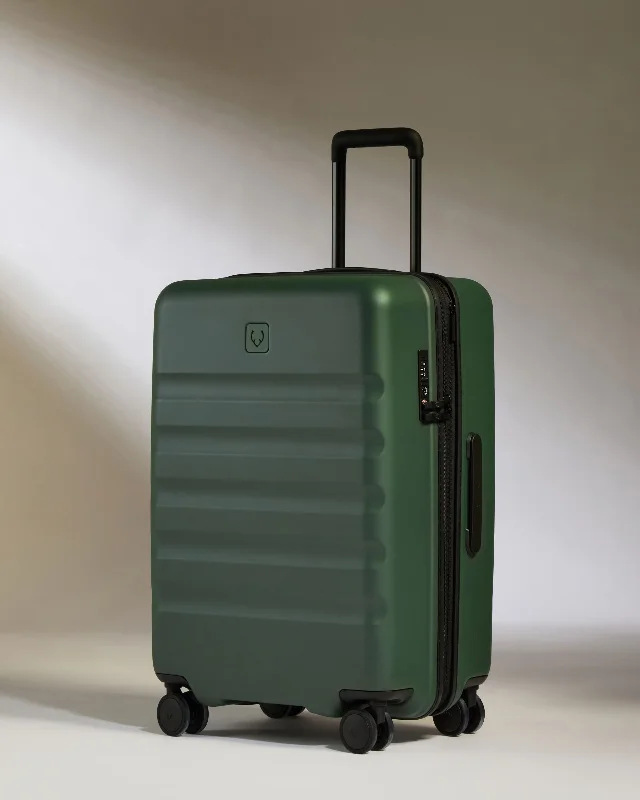 Hanging Travel Toiletry Bags with Multiple Pockets in TealMedium Suitcase in Antler Green - Icon Stripe