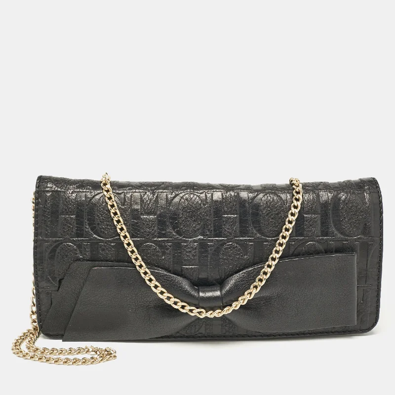 Snake - Skin Effect Clutch in Green for Exotic PartiesCarolina Herrera Black Monogram Embossed Leather Bow Flap Chain Clutch