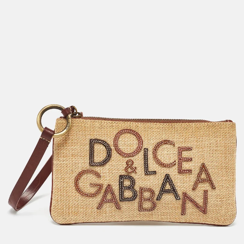 Women's Studded Leather Evening Bag in Black for Rock - n - Roll NightsDolce & Gabbana Beige/brown Raffia And Leather Wristlet Clutch