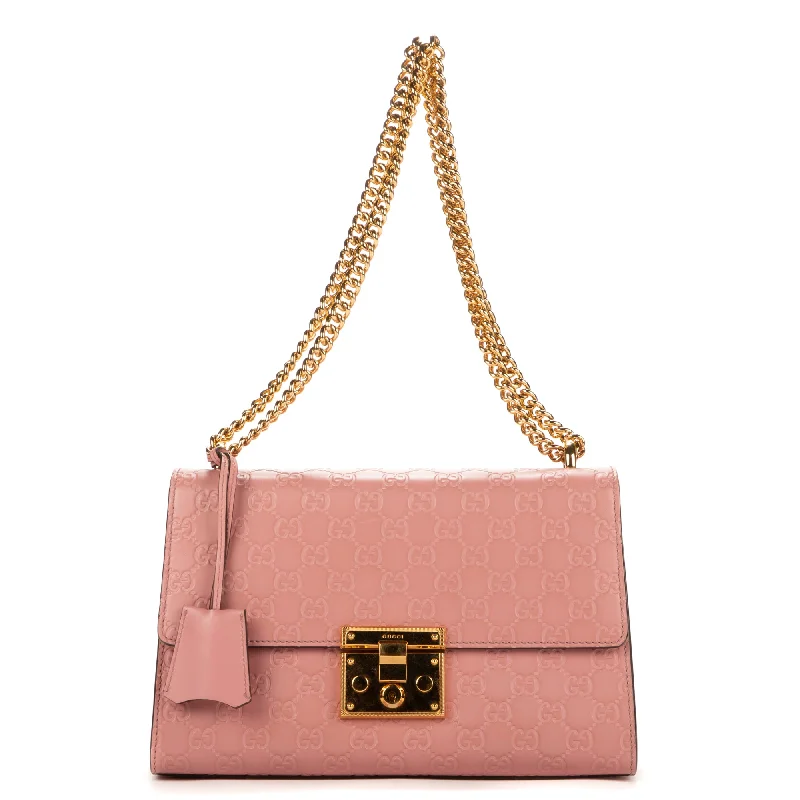 Suede Shoulder Bag in Pink with Tassel Accents for Casual OutingsGuccissima Padlock